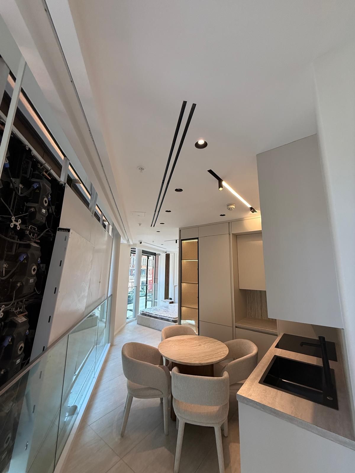 Kitchen and dining area in a finished studio